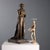 Bronze sculpture depicting a woman with a book. Signature engraved on the side of the base. This piece is attributed to...