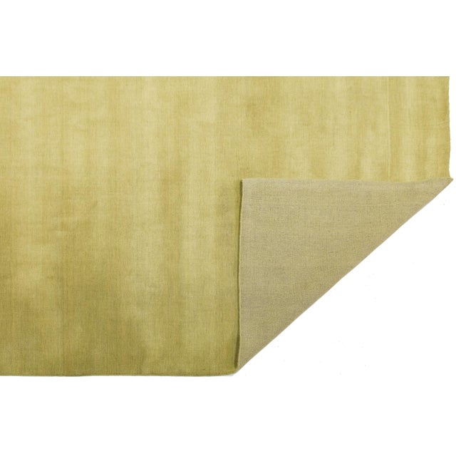 Discover our stunning handcrafted Gabbeh-style wool rug, showcasing a rich Citron design. Proudly part of our Desert...