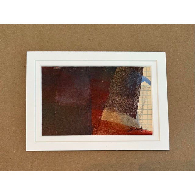 A sophisticated original abstract composition built from richly layered burgundy, rust, charcoal, cream, and muted blue....