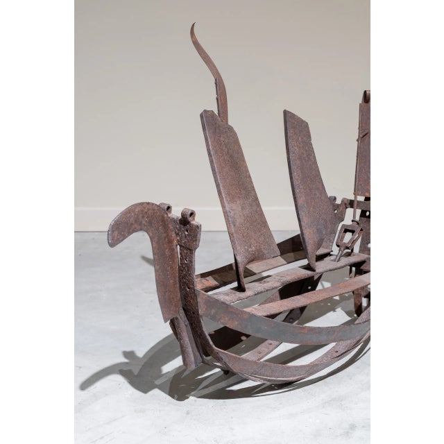 Ship made of rusty iron in the shape of a galleon ship. Patina rust of the iron.