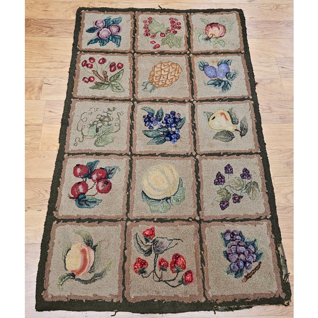 This charming early 20th century vintage American hand-hooked rug is a delightful example of Americana folk art,...