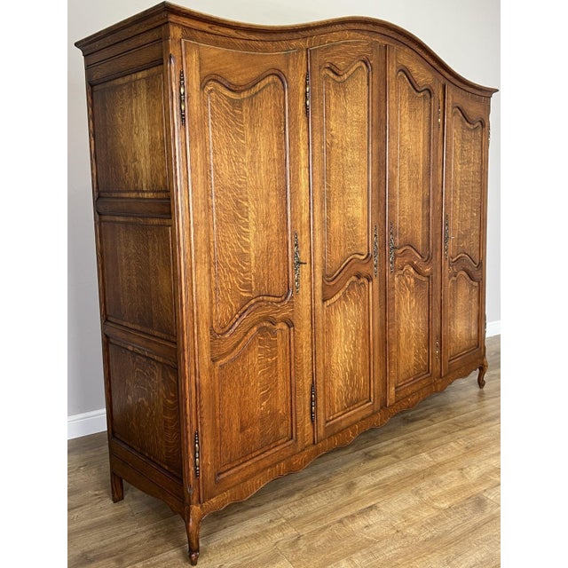 Vintage French Louis XVI Style Carved Oak 4-Door Armoire For Sale - Image 3 of 11