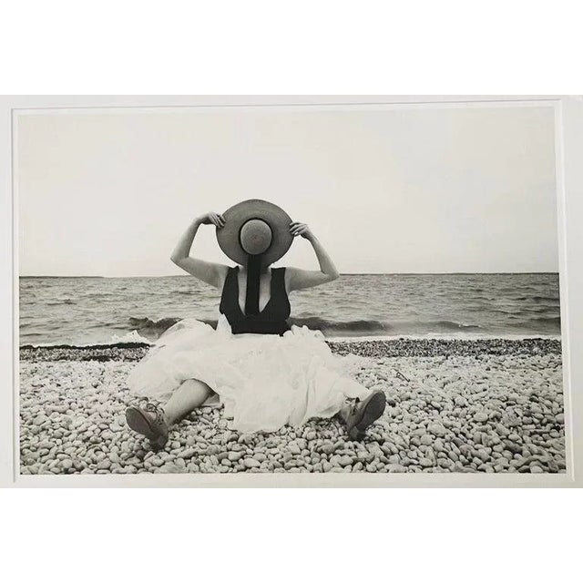 A contemporary portrait of a woman titled "Straw hat" by Luciana Pampalone ( American, 1963). The archival pigment print...
