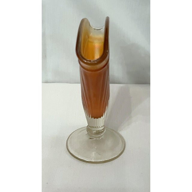 Lovely Dugan marigold carnival glass fan vase with ribbing, set on foot