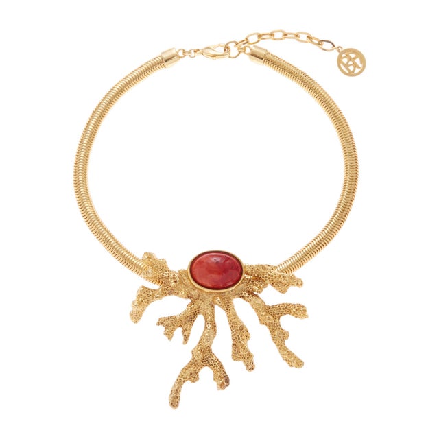 Gold plated cuff style necklace with coral and red stone Measurements: 15 1/2" length, 2" extention, 3 1/2" x 3" pendant