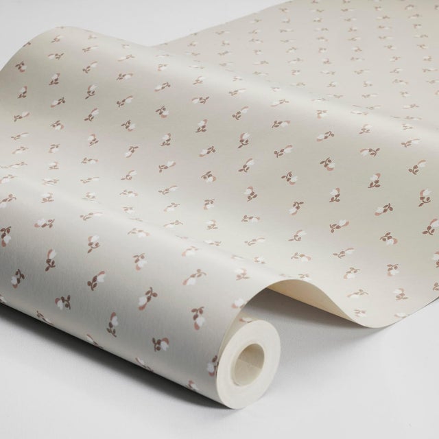 Sweet and simple, Petite Chérie is a delicate small-scale floral pattern. This charming surface-printed wallpaper is a...