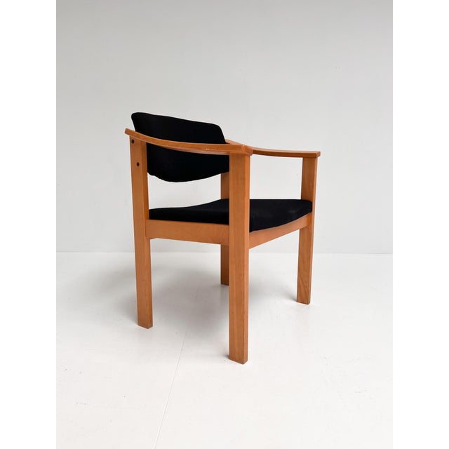 Stylish wooden vintage armchair in the style of Hans Wegner. The chair is inspired by the GE-15 chair, but has no...