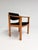 Stylish wooden vintage armchair in the style of Hans Wegner. The chair is inspired by the GE-15 chair, but has no...