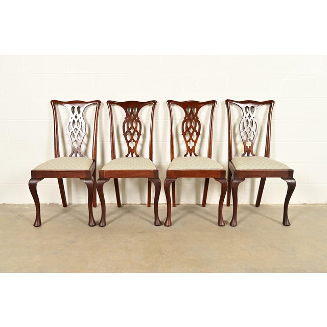 A gorgeous set of four Georgian, Chippendale or Queen Anne style dining chairs In the manner of Henredon USA, Circa...