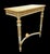 A distinctive French Louis XVI Revival console table, dating to the late 19th century, executed in an elegant ivory-...