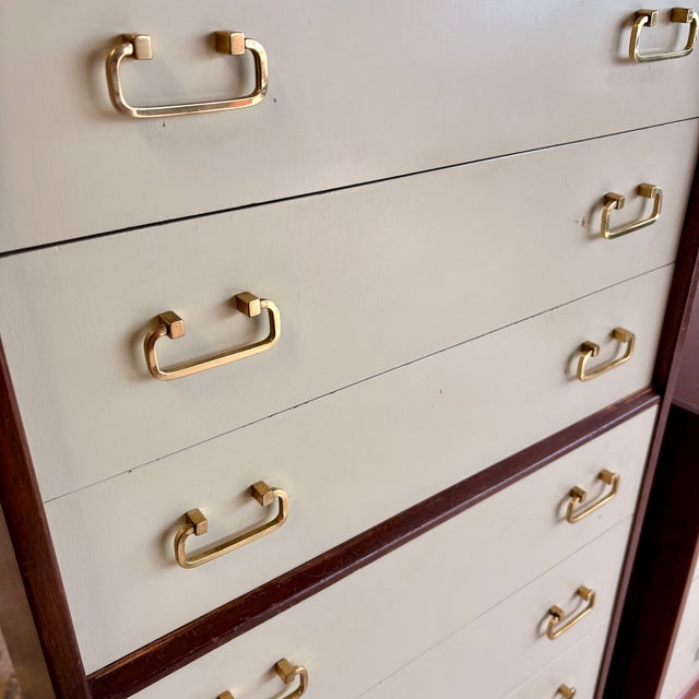 Authentic vintage G Plan “Tola” bedroom set featuring a tallboy chest and matching low dresser with iconic cream drawer...