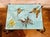 Signed, hand painted tiles from Vallauris, France top off this hand forged iron coffee table. Playful butterflies. Mid...