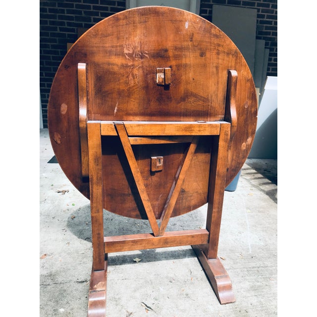 This antique solid birch wood folding table is from France and dated back to 1800s. It was used in the winery for wine...
