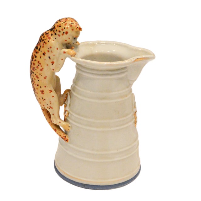 This exquisite Copeland ceramic creamer is a testament to the charm and craftsmanship of early 20th-century English...