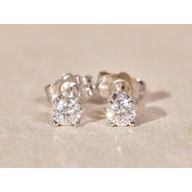The Fonsecas: Ladies 14K White Gold 0.30CTW Natural Diamond Stud Earrings. Crafted in 14 karat white gold, these everyday...