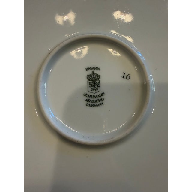 A beautiful mid-century Bavarian porcelain decorative display plate featuring a finely detailed reproduction of "The Young...