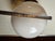 Vintage wall sconce with a modernist design, composed of a white opaline glass globe and a geometric chrome-plated metal...