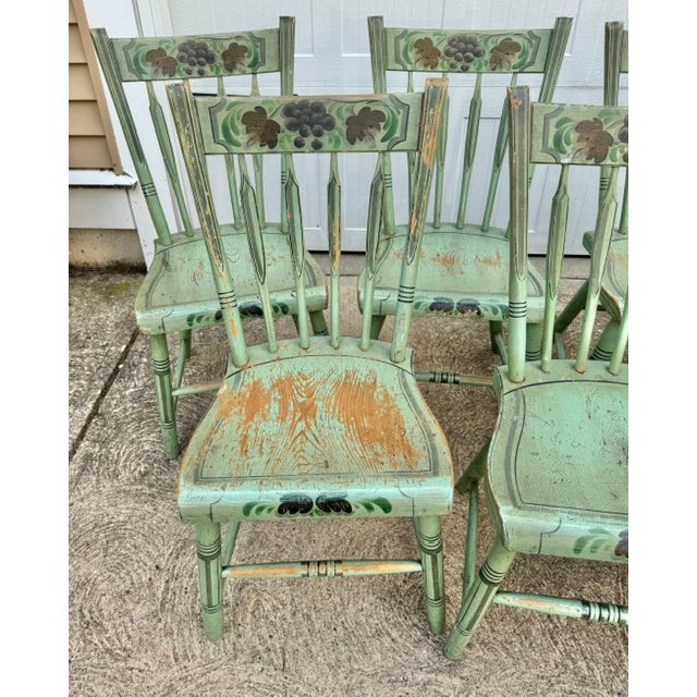 Hard to find a set of paint decorated chairs this long! Chairs were made in Pennsylvania mid 19th century probably before...