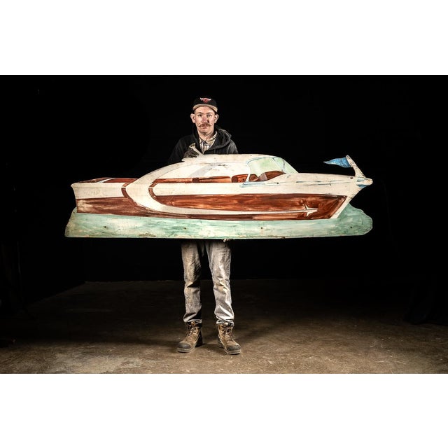 Large vintage painted advertising sign created in the likeness of the 1962 Century Coronado motorboat. The shaped sign...