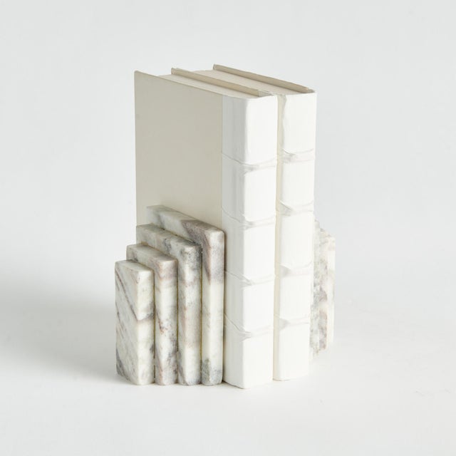 Honed to a semimatte finish, this stunning marble is specifically known for its unique darkBrown to lightBrown broad...