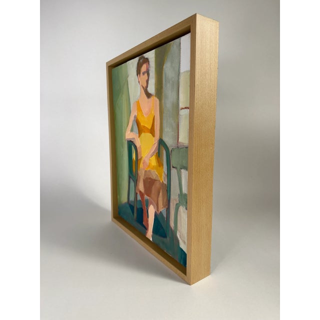 A figural painting of a woman by Jill Worm. Soft, dusty hues evoke a contemplative vibe that captured the stillness of the...