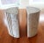 This pair of sculpted bookends features solid travertine stone construction, nicely carved details, and clean modernist...