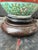An exceptional antique Japanese Kutani porcelain table lamp presenting highly detailed hand-painted artistry on a vivid...