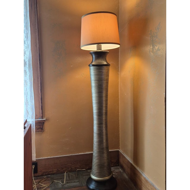 Unique ancient Phoenician style naval pier column with capstan. Striking gold palm leaf finial. Matching gold lampshade....