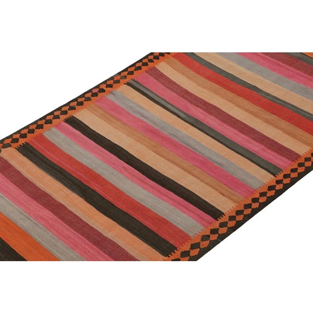 This vintage 5x14 Persian Kilim is believed to be a tribal rug from Meshkin—a small northwestern village known for its...