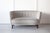 A very sweet and compactly sized 1930's Danish 'Banana' sofa featuring excellent design and craftsmanship. The shape is...