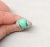 Mid-Century Modern Vintage 1960s Signed Crown Trifari Rhodium Plated Faux-Turquoise & Clear Rhinestone Ring Size 5.5-7.5 For Sale - Image 3 of 9