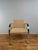 Knoll style Brno chair. The chair features a heavy stainless steel frame that supports the structure of the chair. The...