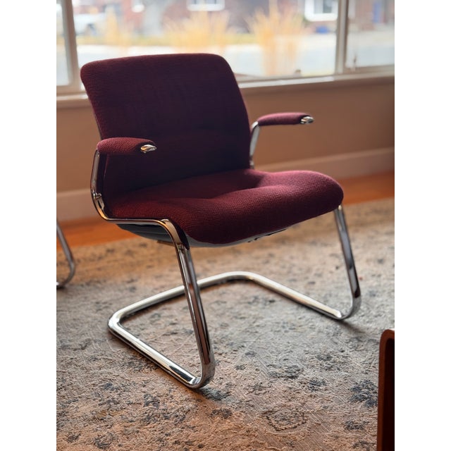 Pair of vintage Steelcase cantilever chairs featuring a clean modernist profile and original upholstery. Model number:...