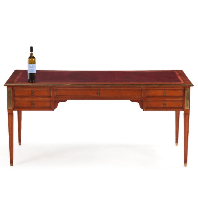 This exceptional French Louis XV style writing desk, dating to circa 1940, is crafted to the highest quality standards and...