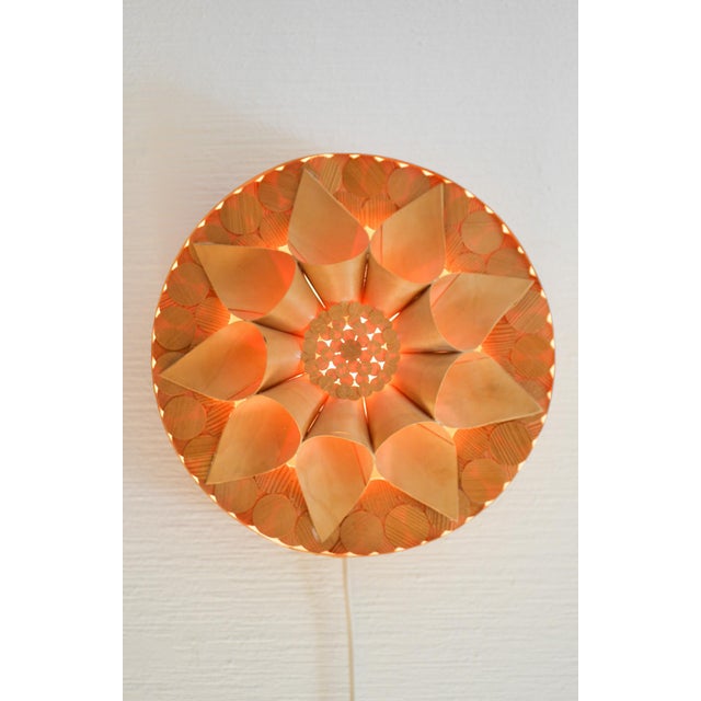 Pair of 1970s Scandinavian Wood-Shaving Sconces A rare and beautifully handcrafted matching pair of sconces made from...