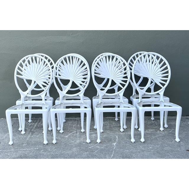 Infuse your dining space with iconic Palm Beach charm with this rare set of eight vintage cast aluminum chairs. Featuring...
