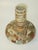 This antique vase is of Meiji-era Japanese origin, specifically from Kyoto Satsuma. Made of ceramic, it features a multi-...