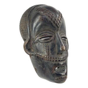 Early 20th Century Tabwa Wood Mask with Awl Holes