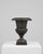 This 1900s French cast iron planter is a striking example of neoclassical garden ornamentation, showcasing timeless...
