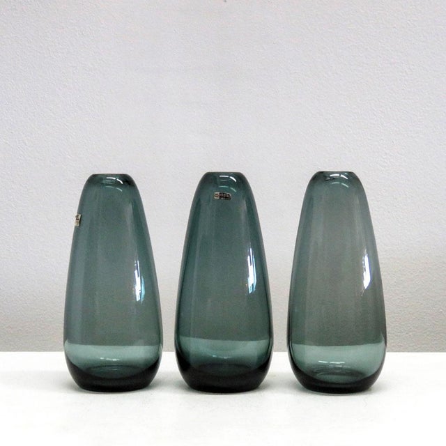 wonderful vases from the ‘Turmalin’ series by Wilhelm Wagenfeld for WMF, blown and cold cut-glass vases, marked. Priced...