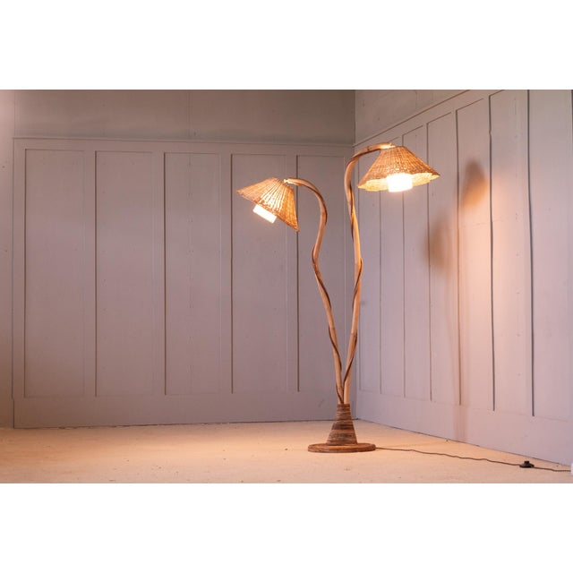 Thalia — Floor Lamp Designed by Bill Parry for Rattanology There is a moment, just after dusk, when a room needs only one...