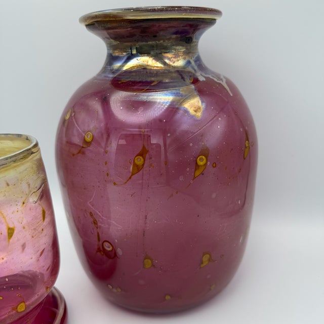 For sale is a beautiful duo from the renowned Eisch glassworks. The pieces feature the world-famous peacock eye design....
