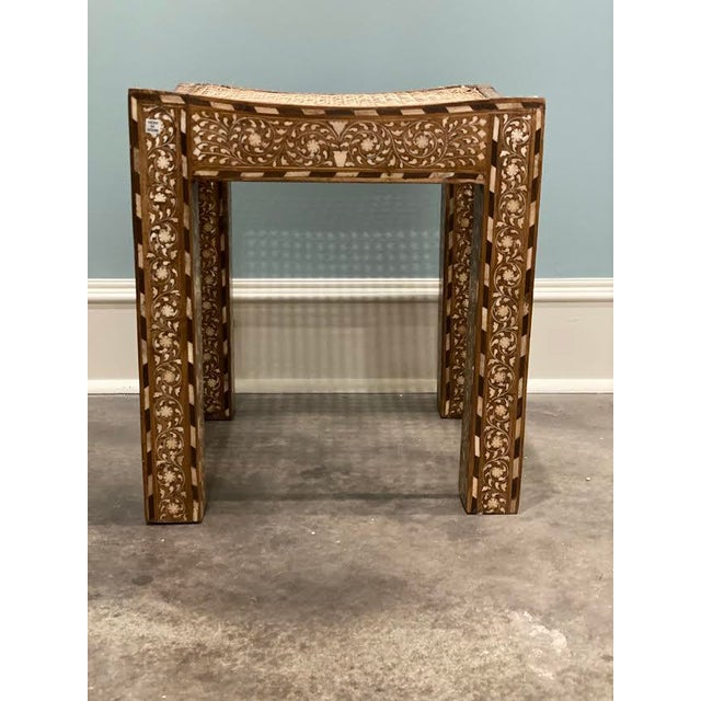 This is a beautiful handmade marquetry stool. The seat of the square stool features a beautiful cane seat detail. The...
