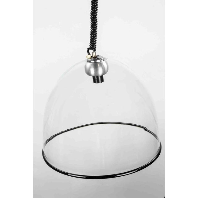 Hanging Lamp realized by Leucos in 1970s. Good condition. This piece is attributed to the mentioned designer/maker. It has...