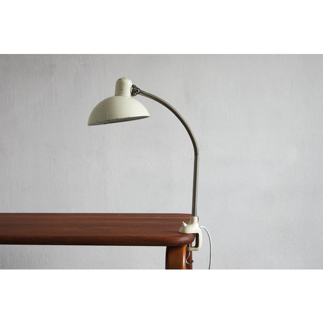 Table mount desk lamp manufactured in 1950s. Original Kaiser Idell lamp designed by Christian Dell in the 1930s. All in...