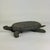 A. most adorable Folk Art turtle. It's been hand carved and assembled then hand painted in hues of mustard yellow, against...