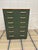Vintage multi drawer chest painted in a deep hunter green by professional paired with contrasting gold handles and a...