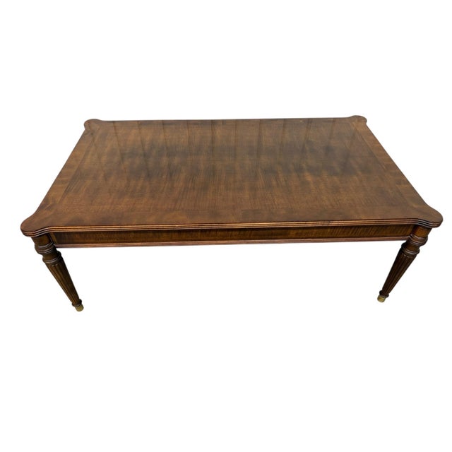 Presenting this elegant Vintage Henredon Mahogany Coffee Table, circa 1990s, showcasing exceptional craftsmanship and...
