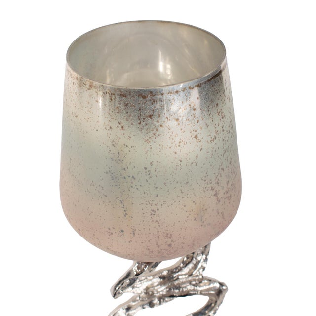 With a twisted, open-loop base that draws the eye, this piece adds dynamic visual appeal. The ombre-finished top casts a...