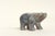 A hand-carved figurine of a walking bear, meticulously fashioned from a single piece of high-quality natural agate. This...